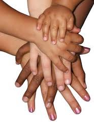 From: http://www.childrenshomeofrdg.org/   Photo of hands stacked.